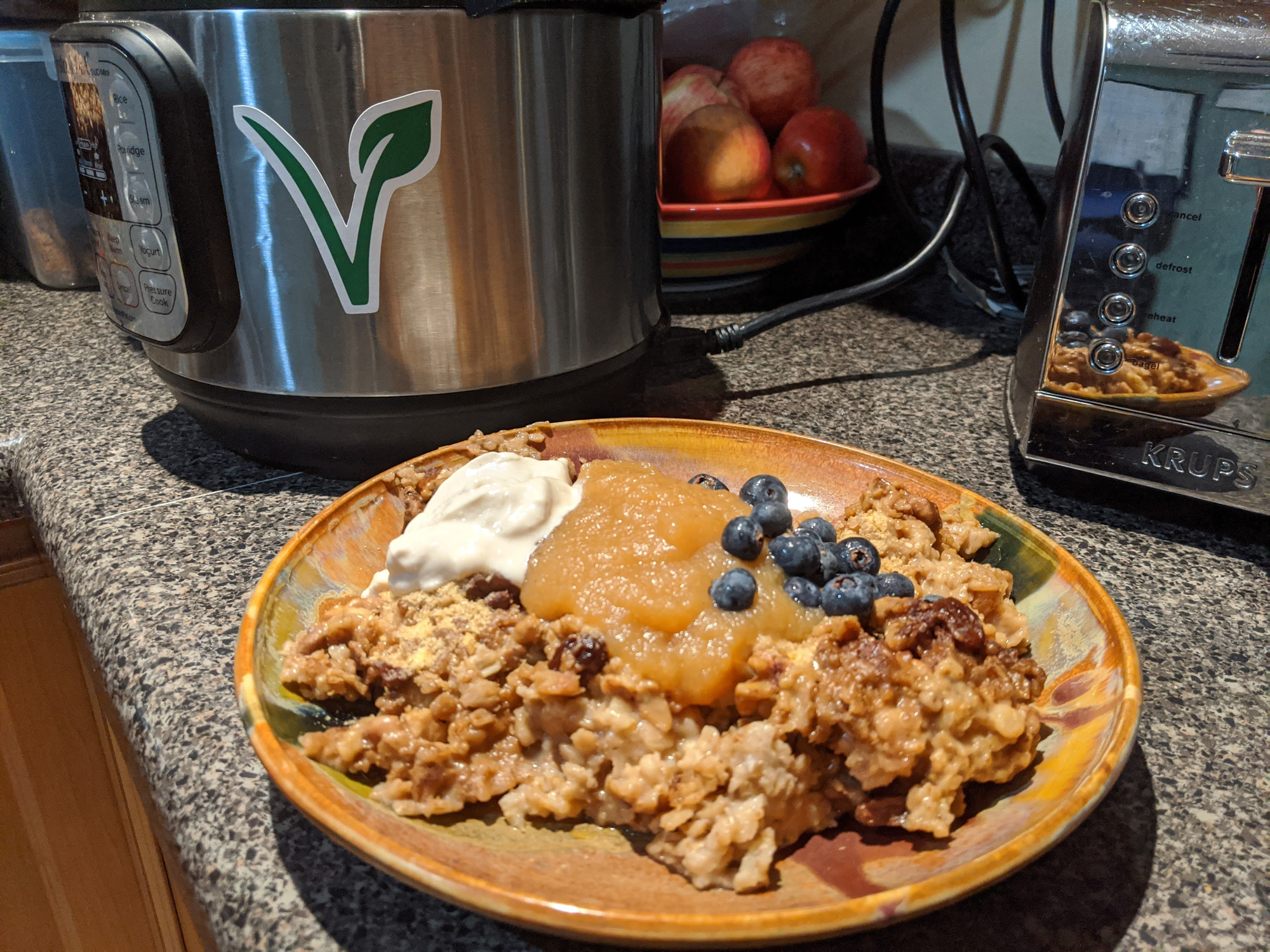 Instant Pot oatmeal with blueberries, applesauce and non-dairy yogurt.