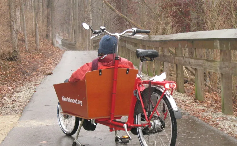 Person sitting in cargo bike 